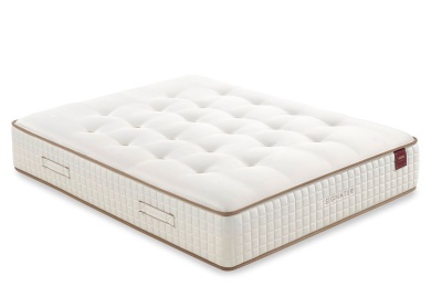 Colchão branco com textura acolchoada e alças laterais