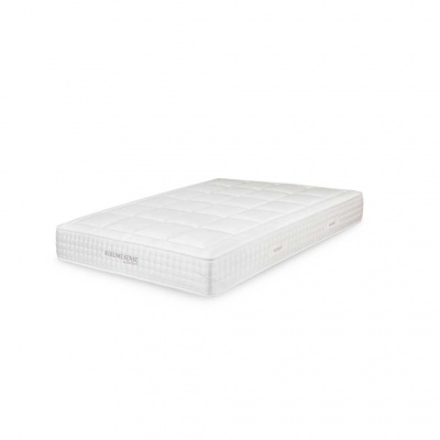 Colchão branco BERLINDESIGN com padrão acolchoado e etiqueta lateral.