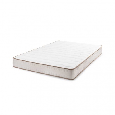 Colchão branco com bordas bege e padrão ondulado na superfície