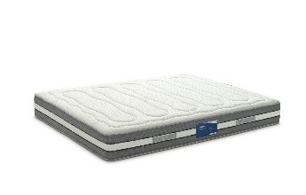 Colchão branco e cinza com etiqueta azul e padrão ondulado no topo