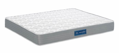 Colchão retangular branco com bordas cinza e etiqueta azul Orthopedic