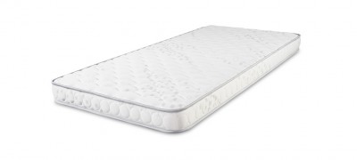 Colchão branco acolchoado com padrão de pontos e bordas com círculos