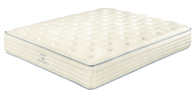 Colchão branco com textura acolchoada e padrão de pequenos quadrados nas laterais