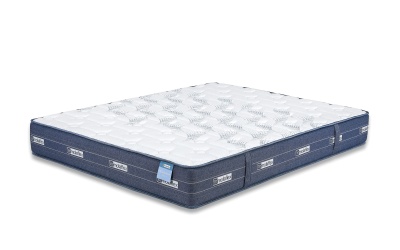 Colchão branco com laterais azuis e etiquetas TEMPUR