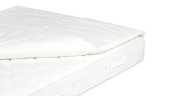 Colchão branco com textura acolchoada em padrão ondulado