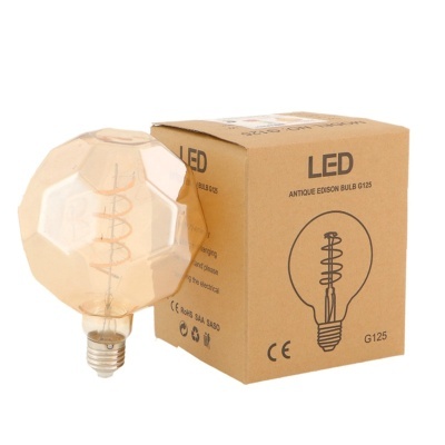 Lâmpada LED facetada transparente e caixa de cartão castanha com texto e desenho da lâmpada