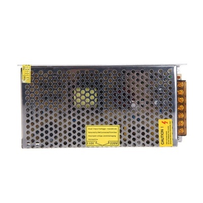 Fonte de alimentação metálica com rótulos amarelos e ventilação circular