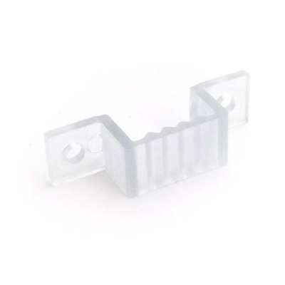 Peça plástica transparente com furos e desenho recortado