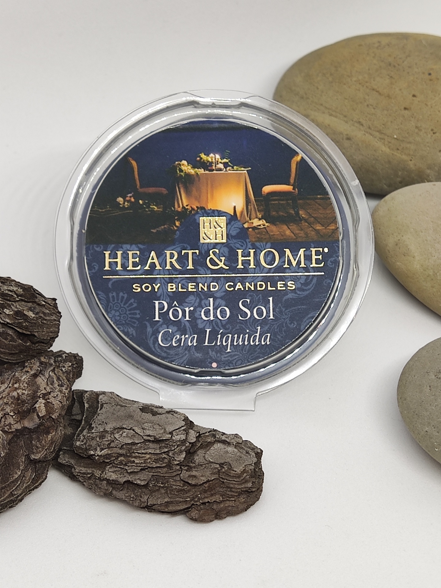 Vela líquida HEART & HOME Pôr do Sol com rótulo azul e decoração natural