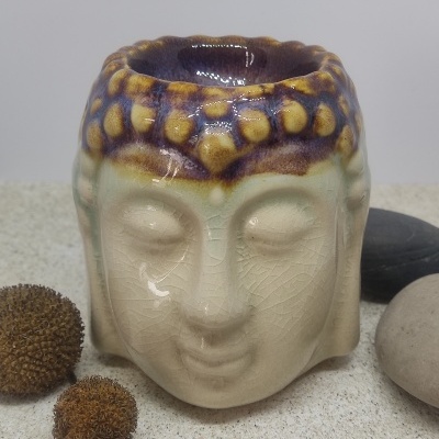 Vaso cerâmico cabeça de Buda com padrão amarelo e castanho e acabamento craquelado