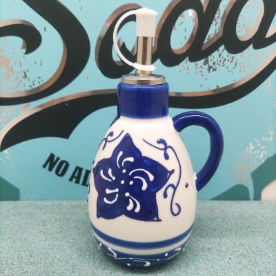 Frasco dispensador cerâmico branco e azul com tampa metálica
