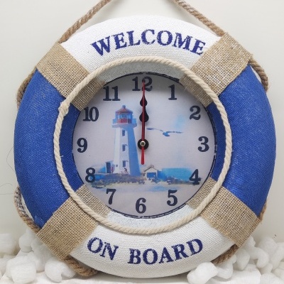 Relógio decorativo em forma de bóia salva-vidas com texto Welcome on Board