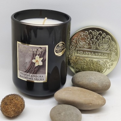 Vela perfumada preta com tampa dourada e pedras decorativas