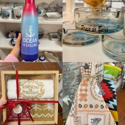 Conjunto de garrafas térmicas, cinzeiros de vidro, toalhas bordadas em caixa e bonecos de pano com padrões coloridos.