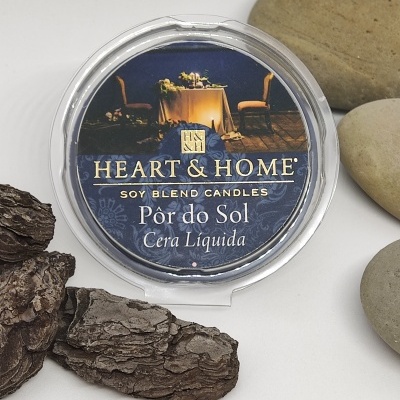 Vela líquida HEART & HOME Pôr do Sol com rótulo azul e decoração natural