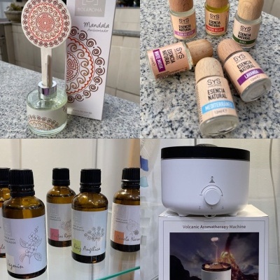 Produtos para aromaterapia incluindo difusor de mandala, frascos de aromas naturais, óleos essenciais e máquina aromática vulcânica