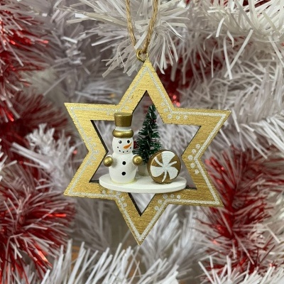 Enfeite de Natal estrela dourada com boneco de neve, árvore de Natal e bolacha