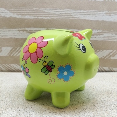 Mealheiro porco verde com flores e insetos coloridos