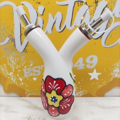 Frasco cerâmico branco com duas saídas e decoração floral colorida