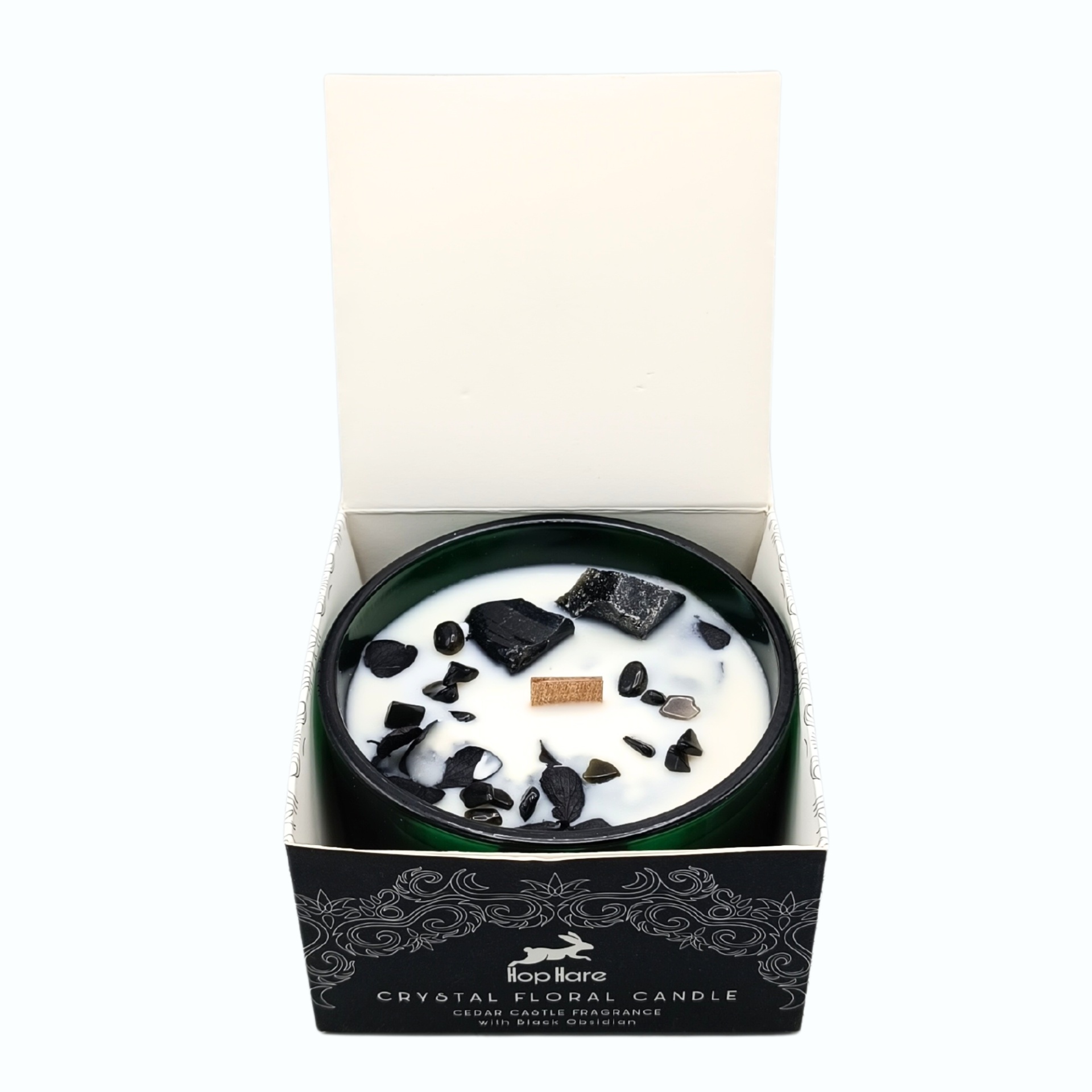 Vela Mágica Floral de Cristal Hop Hare - O Cavaleiro de Espadas Vela decorativa com cristais pretos em recipiente preto, dentro de embalagem preta com texto.