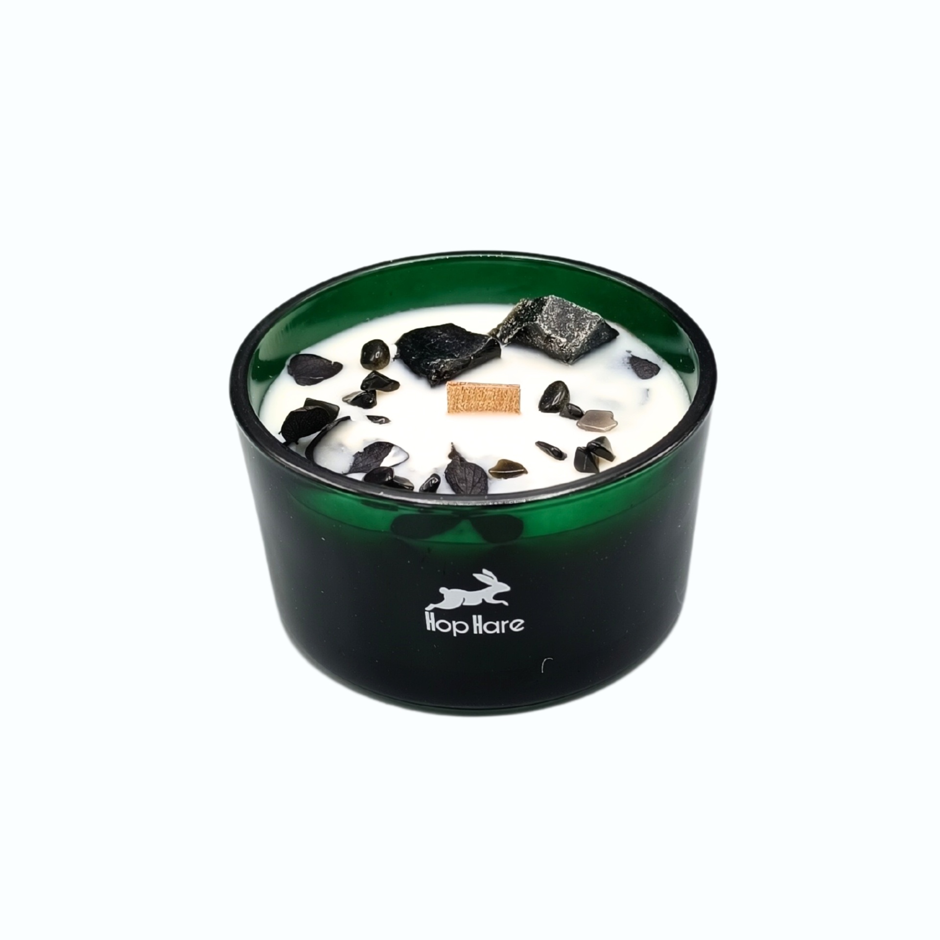 Vela Mágica Floral de Cristal Hop Hare - O Cavaleiro de Espadas Vela perfumada em recipiente verde escuro com pedaços pretos e pavio de madeira