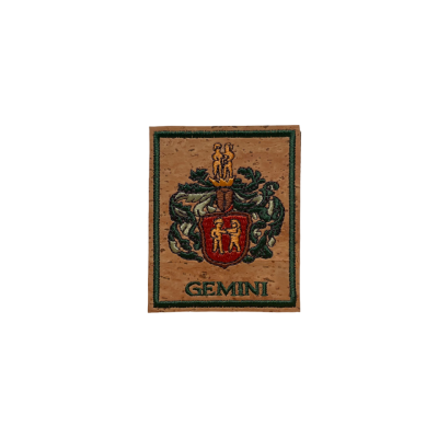 Etiqueta de cortiça com brasão e texto GEMINI