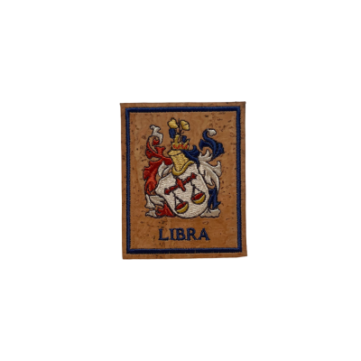 Emblema bordado com padrão heráldico e texto LIBRA