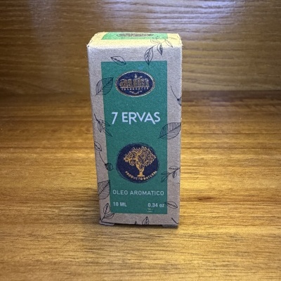 Embalagem de óleo aromático 7 Ervas em caixa de cartão reciclado com rótulo verde e detalhes de folhas pretas