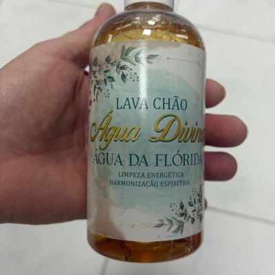 Frasco de Lava Chão Água Divina ÁGUA DA FLÓRIDA com líquido amarelo e rótulo decorado