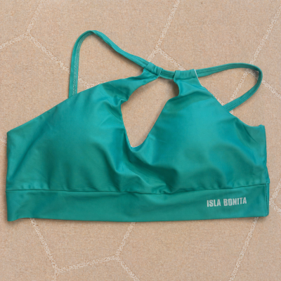 Top de bikini verde água com texto ISLA BONITA