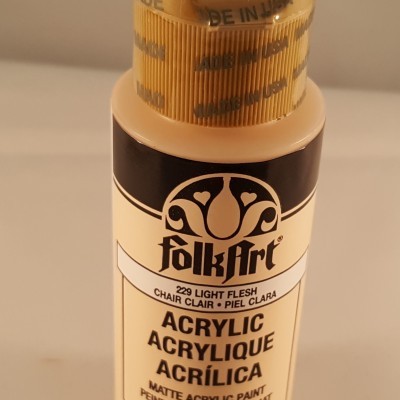 Frasco de tinta acrílica FolkArt cor Light Flesh com tampa dourada e rótulo detalhado.