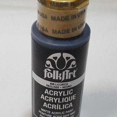 Frasco de tinta acrílica preto FolkArt com tampa dourada e rótulo com texto.