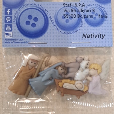 Pack de botões decorativos Natividade com figuras coloridas em embalagem transparente