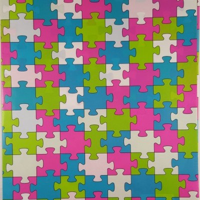 Papel de embrulho com padrão colorido de peças de puzzle