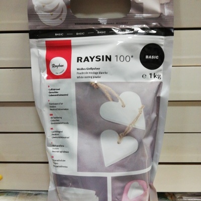 Saco de pó branco modelador RAYSIN 100 BASIC de 1 kg com imagens de corações brancos pendurados