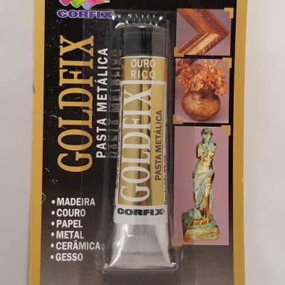 Embalagem de pasta metálica Goldefix Ouro Rico da Corfix, com imagens de moldura, vaso e estátua