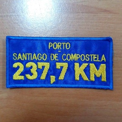 https://www.alberguedebarcelos.com/product/emblema-porto-greater-than-santiago
