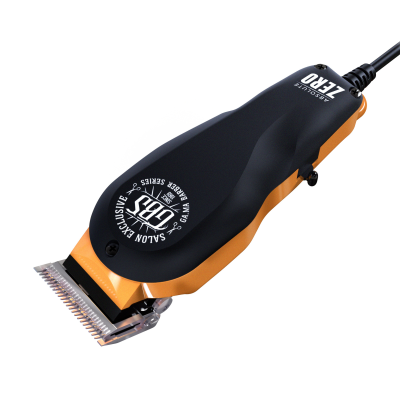 Máquina de cortar cabelo elétrica preta e laranja com lâminas metálicas