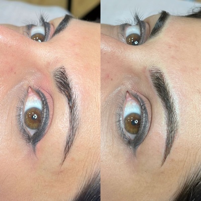 Olhos femininos com sobrancelhas naturais e delineado preto