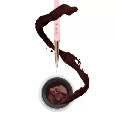 Caneta delineadora rosa com tinta castanha em forma artística