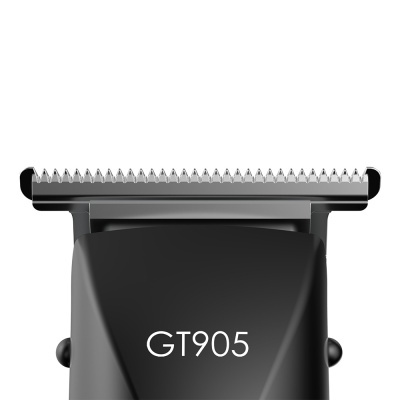 Aparador de cabelo preto com lâmina prateada e inscrição GT905