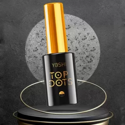 Frasco preto e dourado com rótulo YOSHI TOP DOTS em fundo cinzento.