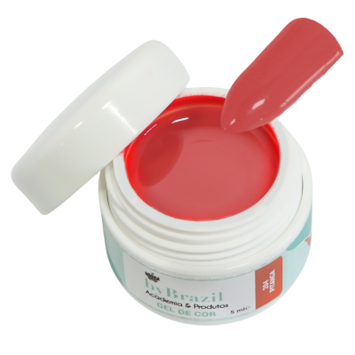 Gel de cor vermelha para unhas em frasco branco aberto com tampa ao lado