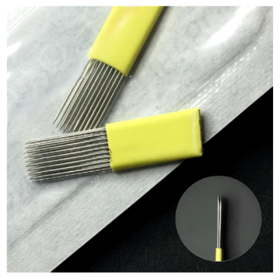 Ferramentas com cabos amarelos e agulhas metálicas finas em mesa