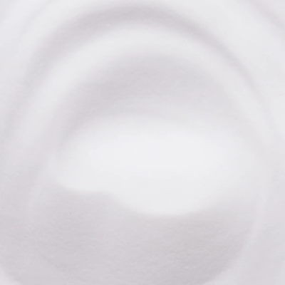 Superfície branca texturizada com padrões circulares ondulados