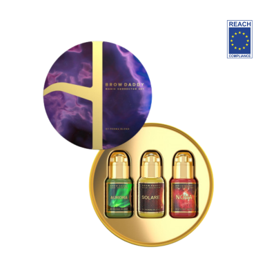 Conjunto cosmético para sobrancelhas com três frascos coloridos em embalagem redonda dourada e tampa roxa com cruz dourada