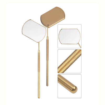 dois espelhos dentários dourados com cabo texturizado