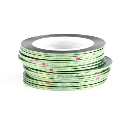 Rolo de fita decorativa verde com padrão brilhante e quadrados cor-de-rosa