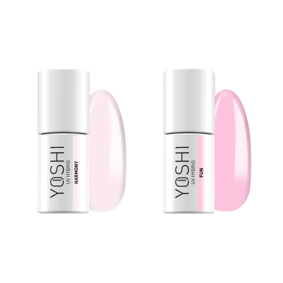 Dois frascos de verniz de unhas YOSHI UV HYBRID rosa claro e rosa vivo com tampas brancas.