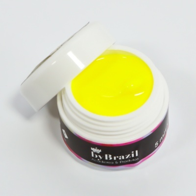 Frasco pequeno de gel amarelo com tampa branca e rótulo preto Dx Brazil